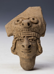 anthropomorphic representation on fragment of vessel, art of ecuador