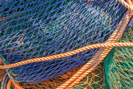 Blue, green and orange sea fishing nets 