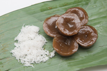 Thai dessert wrapped in banana leaves