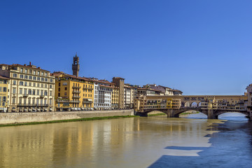 Fototapeta na wymiar Embankment of Arno river, Florence