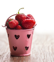 bucket of ripe juicy strawberries