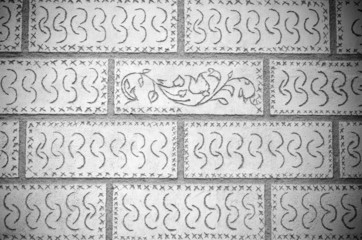 Decorated brick wall