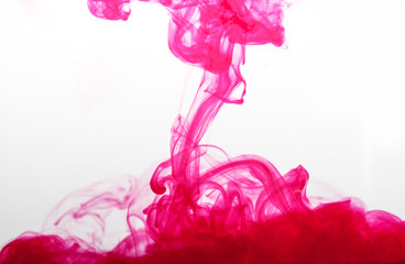 pink ink spread in water © zhu difeng