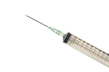 Syringe with drop isolated on white