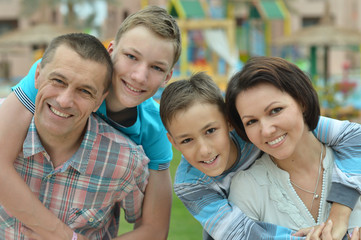 Family  in  garden at vacation resort