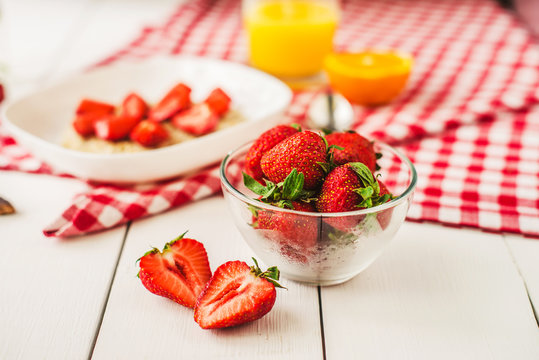strawberries on white table