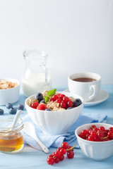 healthy breakfast with cornflakes and berry