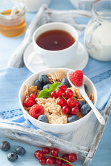 healthy breakfast with cornflakes and berry