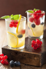 summer lemonade with berry and lemon
