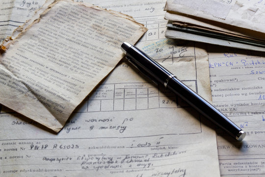 Old documents and pen