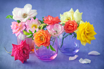 Floral composition with a roses on a table. 
