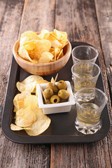 potato chip and cocktail in glass