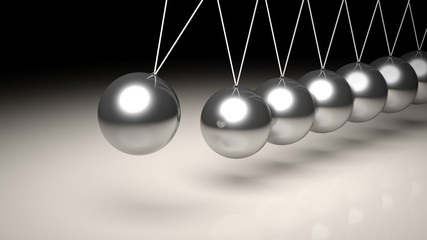 Newton's cradle closeup abstract background