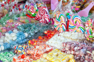 Market stall full of colorful bonbons and sweets