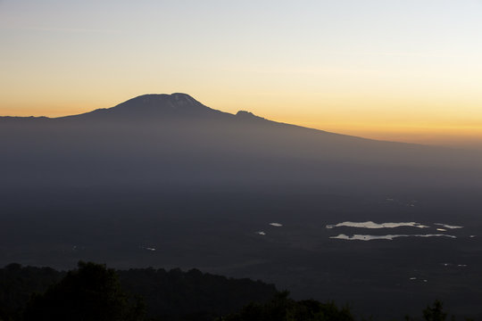 Sunrise views over to Mt Kilimanjaro from Mt Meru in Tanzania, Africa. 