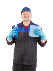 Man holds spray bottle and sponge.