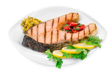 Grilled salmon steak with vegetables.