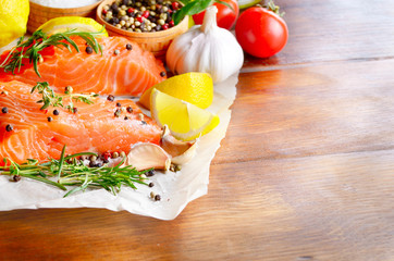 Raw salmon on baking paper