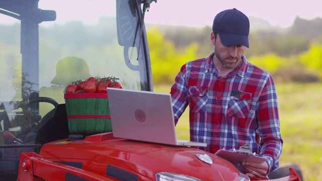 Farmer using laptop computer