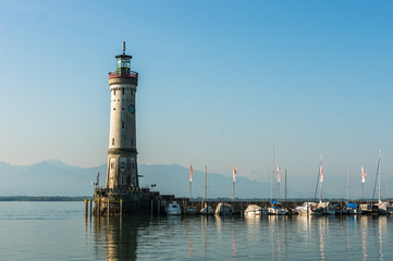 Harbor of Lindau at morning and lighthouse in lake Constance