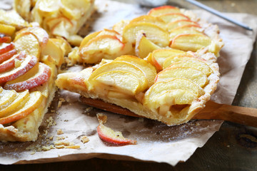 Two pieces tart on a napkin