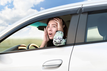 Young woman driving  car