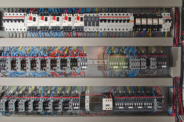 Electrical panel at a assembly line factory. Controls and switches