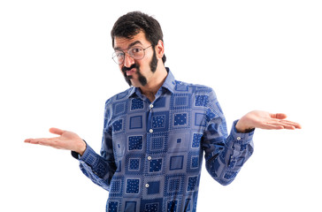 Vintage young man making unimportant gesture