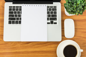 Notebook laptop and coffee cup