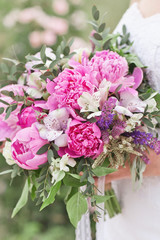 Pink wedding bouquet with peony