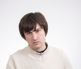 Fototapeta premium Young man expressing emotions