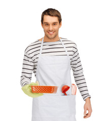 happy man or cook with baking and kitchenware