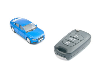 Obraz na płótnie Canvas blue car and car keys with alarm