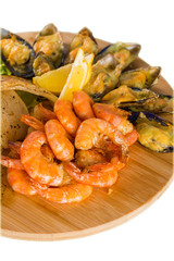 Shrimps, mussels, fish with lemon
