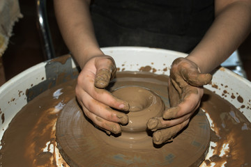the clay pot is made children's hands  