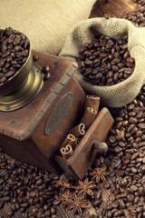 Coffee beans and old grinder