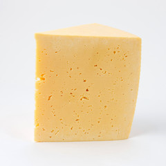 a piece of cheese on a white background