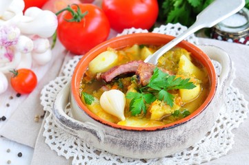 fresh vegetables, tomatoes, garlic, potatoes and parsley with smoked pork ribs