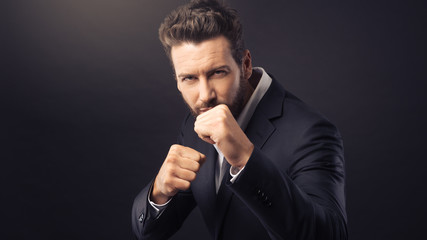 Angry businessman showing fists