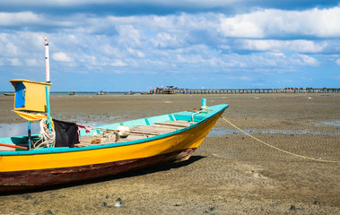 Fishing boat with jetty background