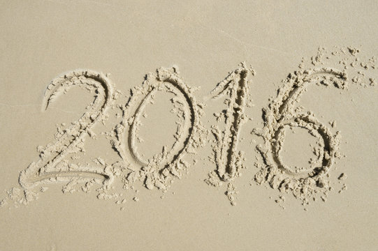 Simple 2016 Message Handwritten on Sand Beach