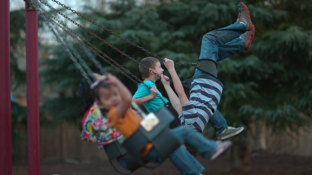 Kids swinging in slow motion; shot on Phantom 