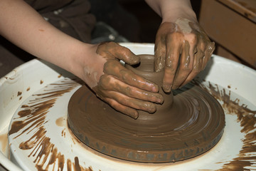 the clay pot is made children's hands  