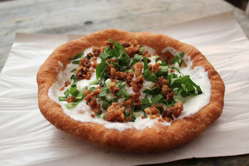 Langos, traditional Hungarian food, at Budapest market