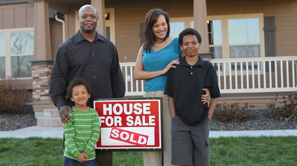 Happy African American family buy a house 