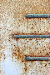 Parasitic rusting steel and corrosion.