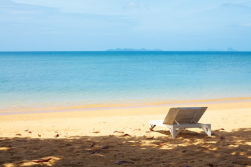 Fototapeta na wymiar Chaise lounge on a beach