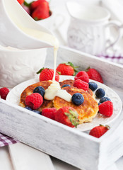 Cheese pancakes with fresh berries