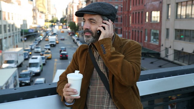 Casual businessman talks on cell phone