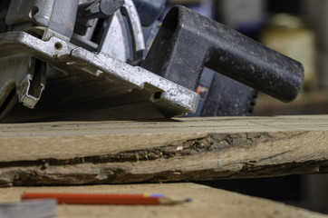 Pencil with saw machine.